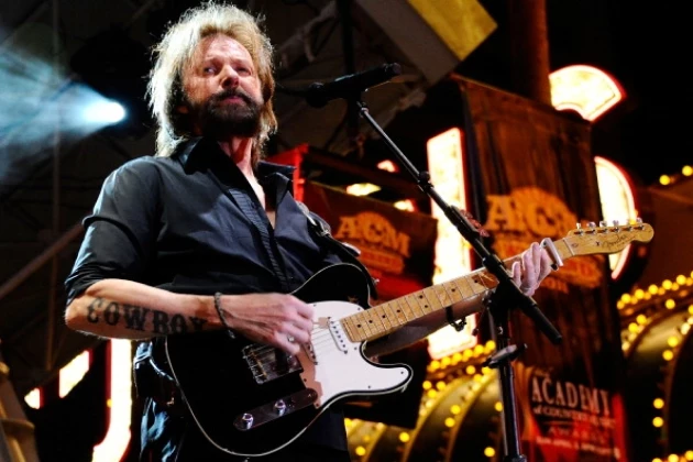 Ronnie Dunn performs onstage during the Academy of Country Music concerts at the Fremont Street Experience Ronnie Dunn performs onstage during the Academy of Country Music concerts at the Fremont Street Experience